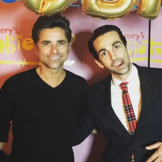 Scot Nery posing with a guest celebrity at Boobietrap
