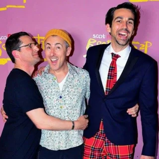 Scot Nery posing with Alan Cumming and another guest at Scot Nery's Boobietrap